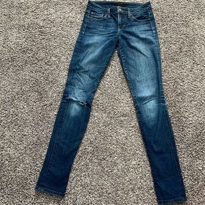 Joes Jeans with small rip in knee